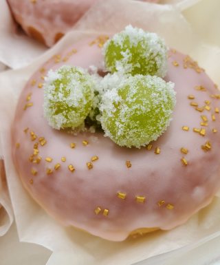 Rosé champagne glazed Mother’s Day donut topped with rosé-aged sugar green grapes, elegantly presented in a gift box.